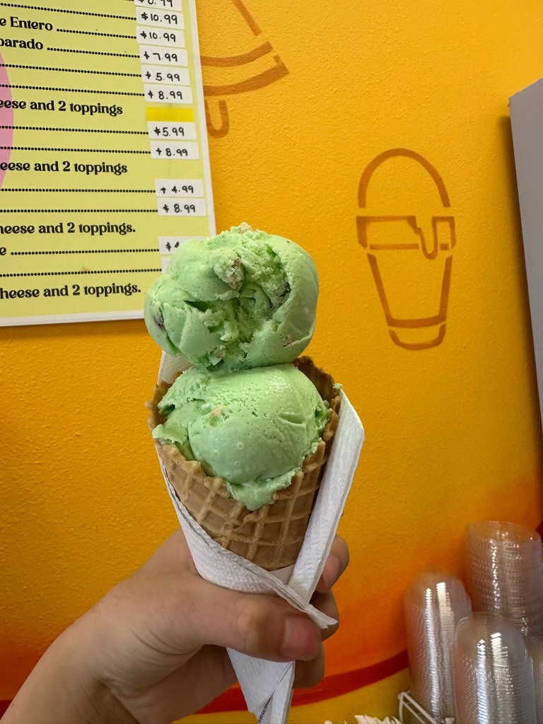 green flavored ice cream on waffle cone